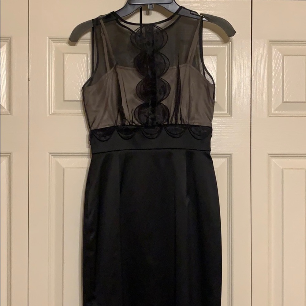 Black and sheer tan cocktail dress